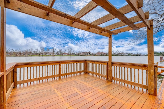 wooden deck with a water view