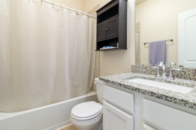 bathroom with toilet, vanity, and shower / bath combination with curtain