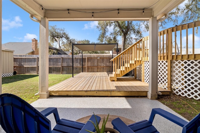 view of patio featuring stairway, a deck, and fence