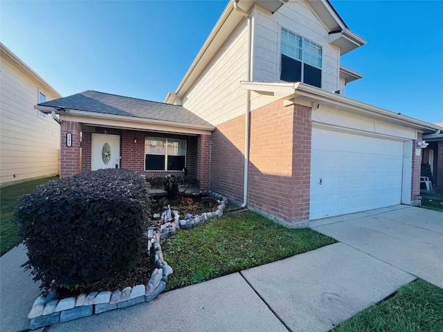 view of front facade featuring a garage, brick siding, driveway, and roof with shingles