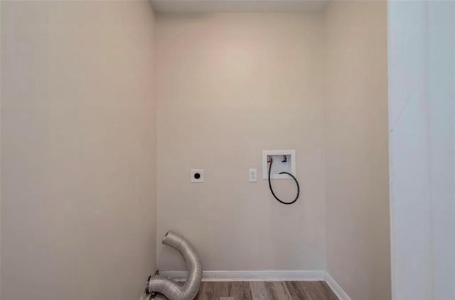 laundry room featuring laundry area, baseboards, wood finished floors, hookup for a washing machine, and hookup for an electric dryer