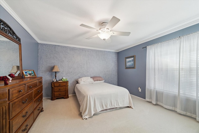 bedroom with baseboards, a ceiling fan, crown molding, and light colored carpet