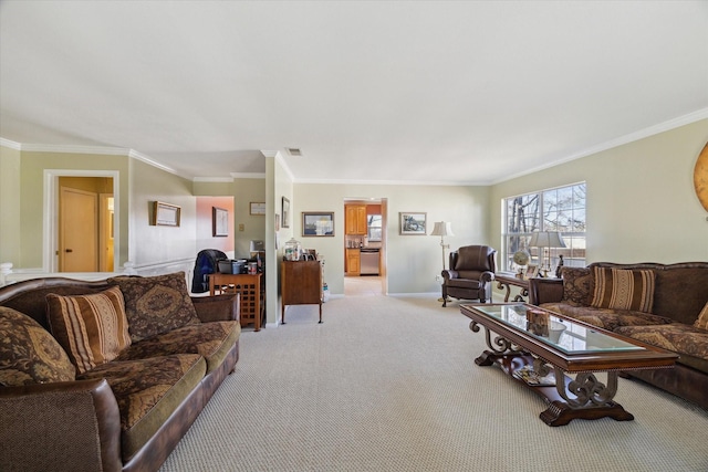 living room with baseboards, visible vents, ornamental molding, and light colored carpet