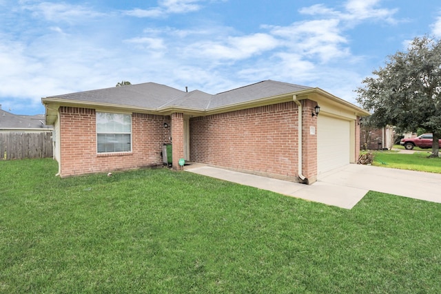 single story home featuring a garage, concrete driveway, a front lawn, and brick siding