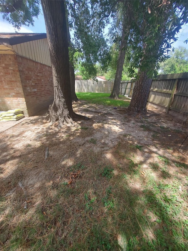 view of yard featuring fence