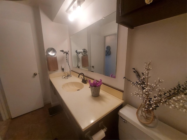 half bath with toilet and vanity