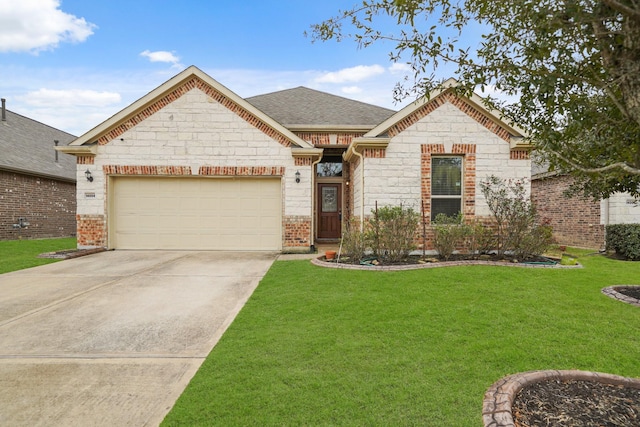 view of front of house featuring brick siding, a shingled roof, a front yard, a garage, and driveway