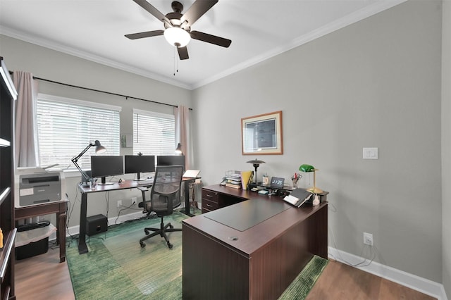 office featuring ceiling fan, crown molding, baseboards, and wood finished floors