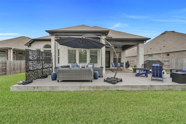 exterior space with fence, an outdoor living space, and grilling area