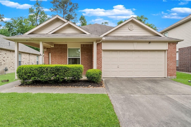 ranch-style home featuring a garage, driveway, a front yard, and brick siding