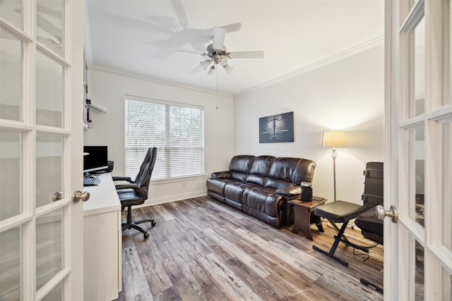 home office featuring ceiling fan, baseboards, ornamental molding, french doors, and wood finished floors