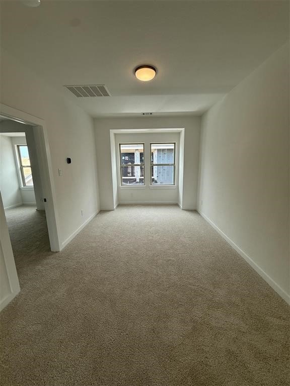 27015 Aurora Garden Ln, Katy, TX 77493 - carpeted empty room with baseboards