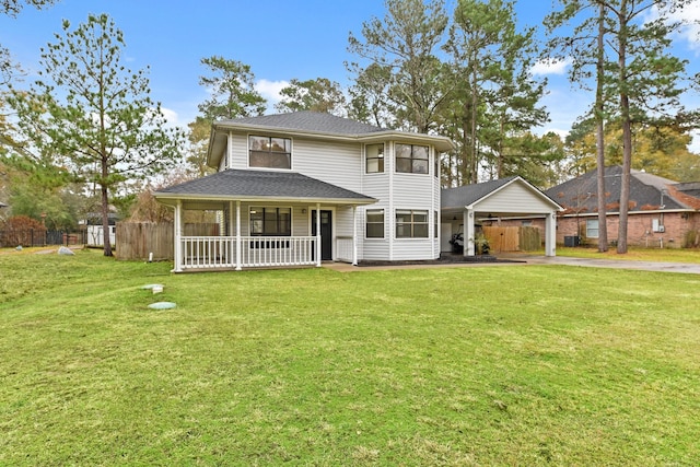 view of front of property with driveway, fence, a porch, a carport, and a front yard