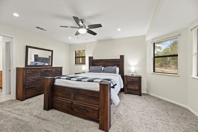 bedroom with recessed lighting, visible vents, light carpet, ceiling fan, and baseboards