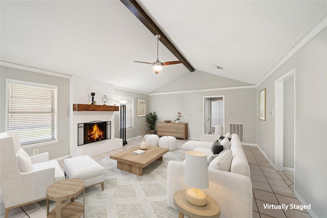 living area with a fireplace, vaulted ceiling with beams, visible vents, and light tile patterned floors