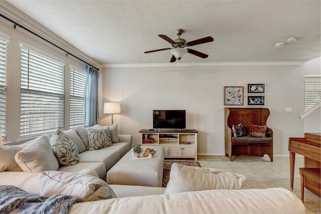 living room with light tile patterned floors, baseboards, ornamental molding, and a ceiling fan