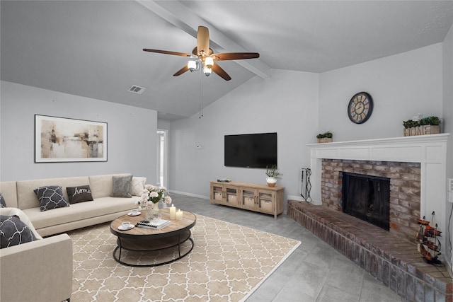 living area featuring vaulted ceiling with beams, ceiling fan, visible vents, baseboards, and a brick fireplace