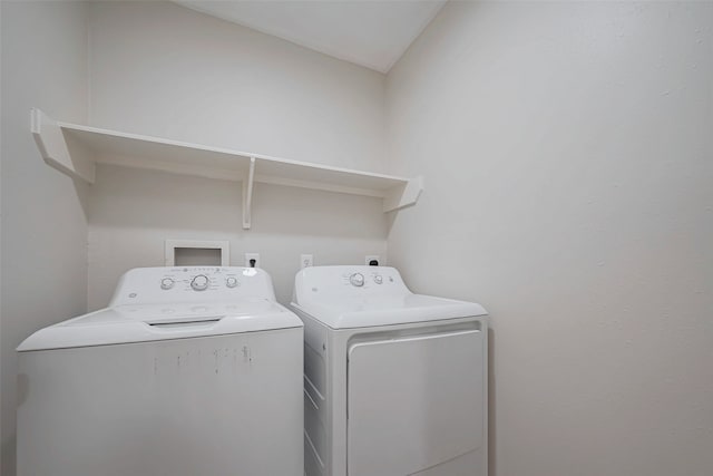 laundry area featuring laundry area and washing machine and clothes dryer