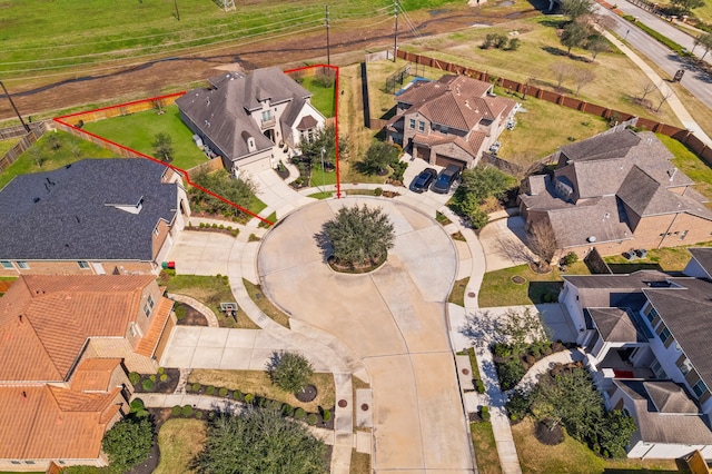 birds eye view of property with a residential view