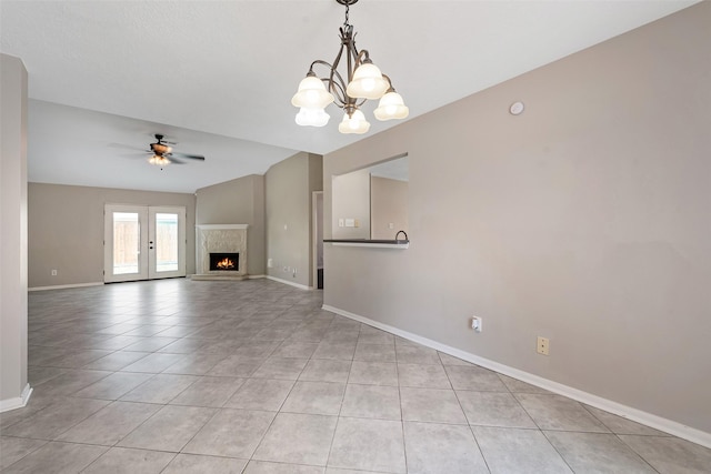 28907 Sedgefield St, Spring, TX 77386 - unfurnished living room with light tile patterned floors, ceiling fan, baseboards, and a chandelier