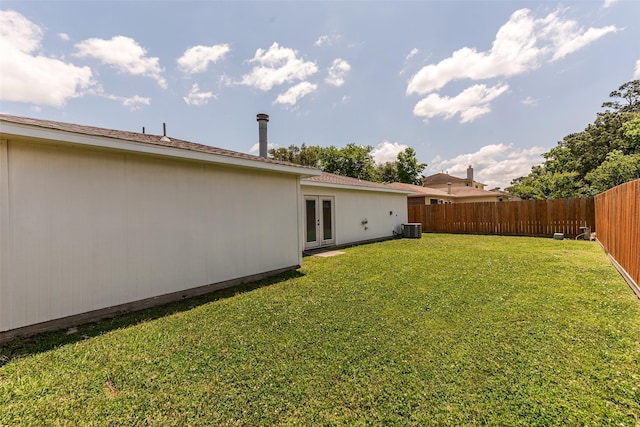 28907 Sedgefield St, Spring, TX 77386 - view of yard featuring french doors and central air condition unit