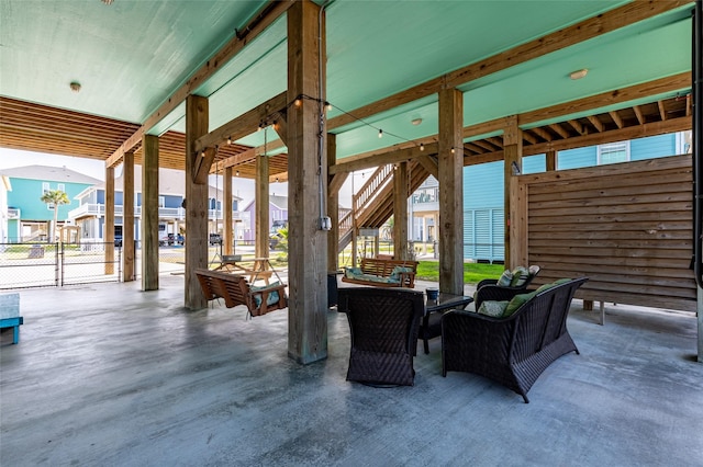 view of patio featuring stairs and an outdoor living space