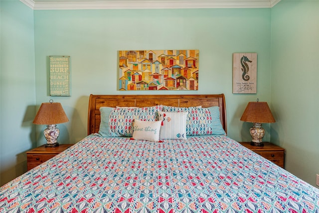 bedroom featuring crown molding