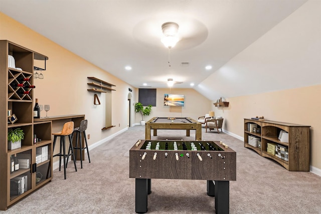 recreation room with lofted ceiling, carpet, and baseboards