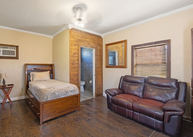 bedroom with baseboards, connected bathroom, ornamental molding, and dark wood-type flooring