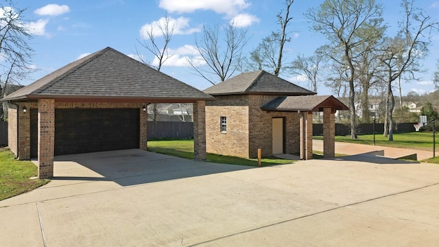 view of front of property with a shingled roof, fence, an outdoor structure, and brick siding