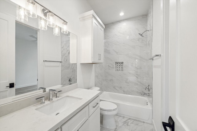 bathroom featuring toilet, marble finish floor, vanity, washtub / shower combination, and recessed lighting