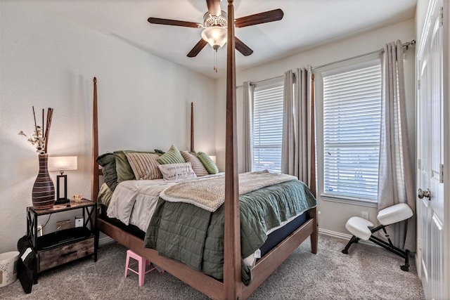 bedroom featuring carpet, baseboards, and ceiling fan