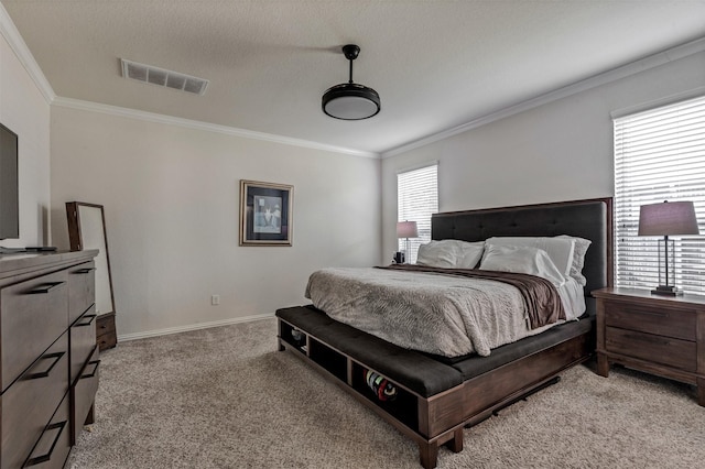 bedroom with light carpet, baseboards, visible vents, and crown molding