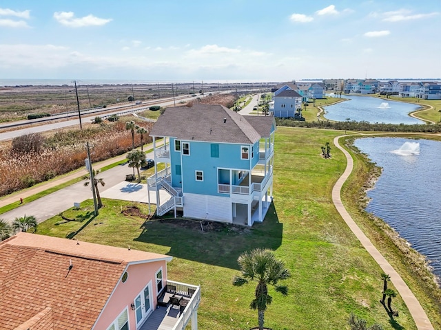 26726 Estuary Dr, Galveston, TX 77554 - aerial view featuring a water view and a residential view