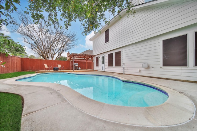 view of pool featuring a patio, a fenced backyard, a fenced in pool, and a pergola