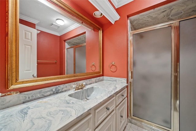 full bathroom featuring visible vents, ornamental molding, a shower stall, and vanity