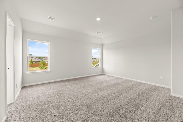 16535 Willow Forest Dr, Conroe, TX 77302 - carpeted empty room featuring baseboards and a smoke detector