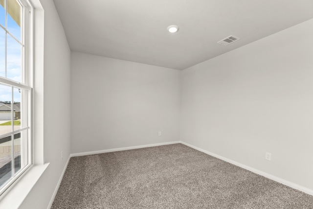 16535 Willow Forest Dr, Conroe, TX 77302 - carpeted spare room featuring plenty of natural light and baseboards
