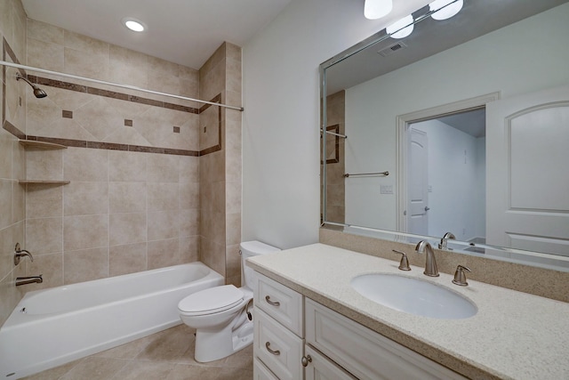 full bathroom with visible vents, toilet, shower / tub combination, tile patterned flooring, and vanity