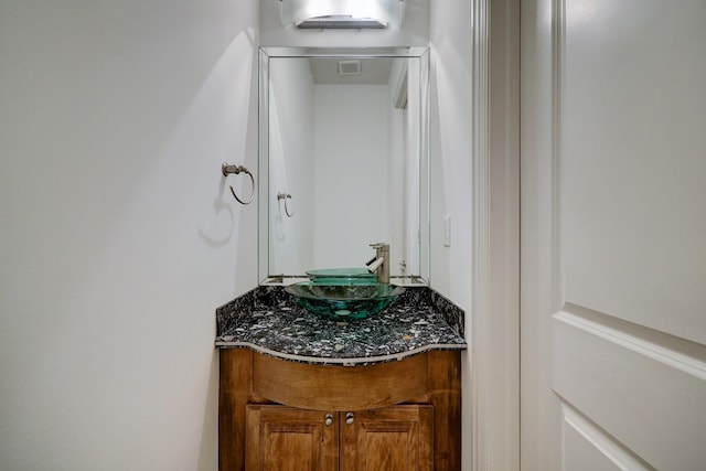 bathroom with visible vents and vanity