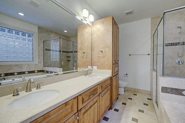 full bath with a stall shower, visible vents, and a sink