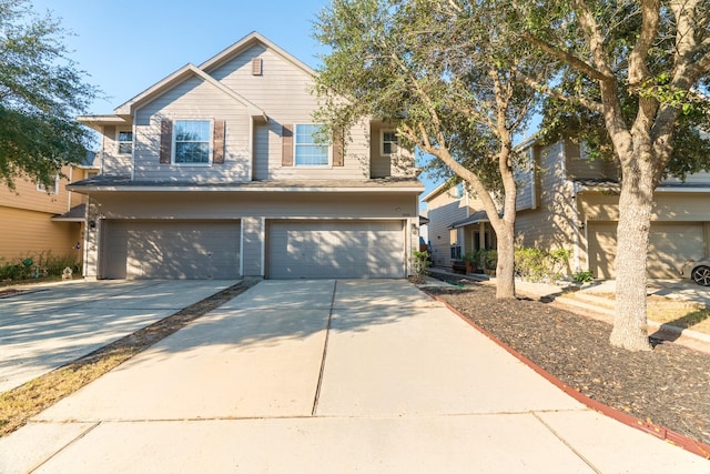 view of front of house featuring a garage and concrete driveway