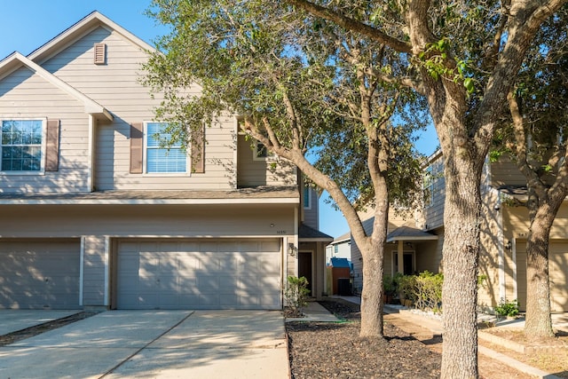 14331 Melody Glen Ln, Houston, TX 77014 - view of front of property featuring concrete driveway and a garage