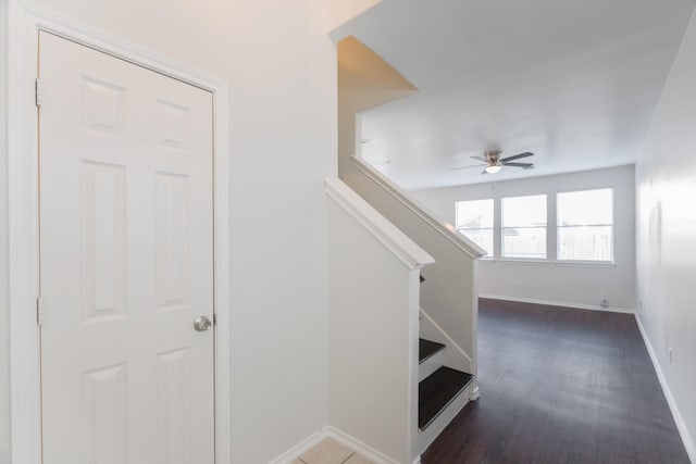 14331 Melody Glen Ln, Houston, TX 77014 - stairs featuring a ceiling fan, baseboards, and wood finished floors