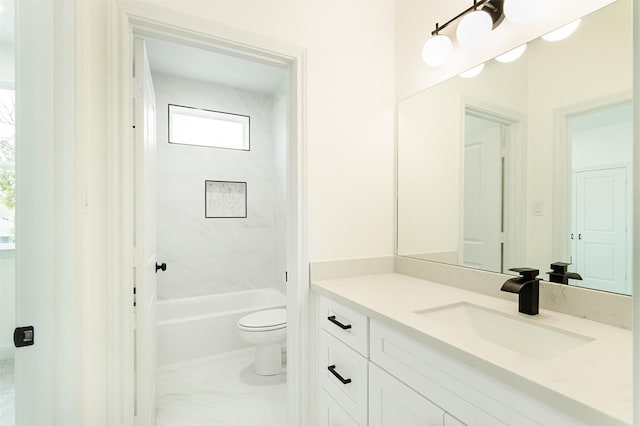 full bath with marble finish floor, vanity, bathing tub / shower combination, and toilet