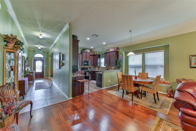 dining room featuring recessed lighting, dark wood-style flooring, visible vents, and baseboards