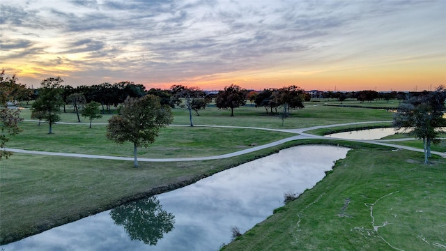 surrounding community featuring a yard