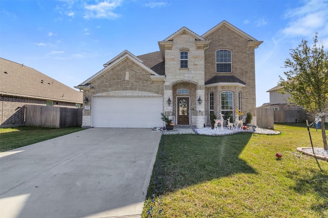 view of front of house with a garage, brick siding, a front lawn, and fence