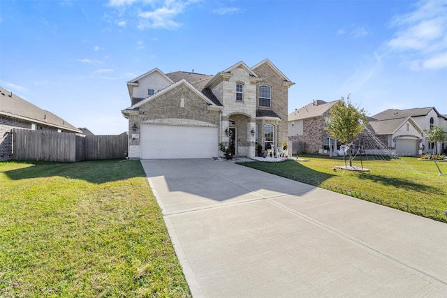 french country home with driveway, stone siding, an attached garage, fence, and a front lawn