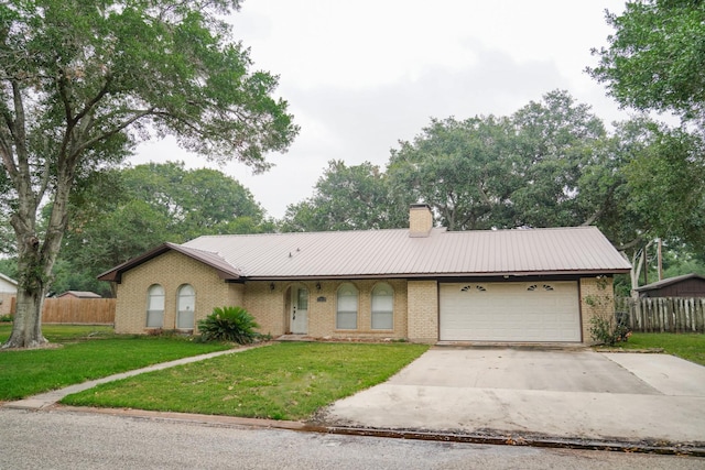 single story home featuring a garage, a front lawn, a chimney, and fence